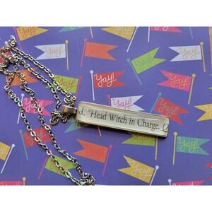 Head Witch in Charge pendant necklace made from The Kiss Curse book pages